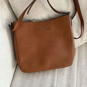 New, with tags off, Michael Kors crossbody/hobo bag. Excellent condition!